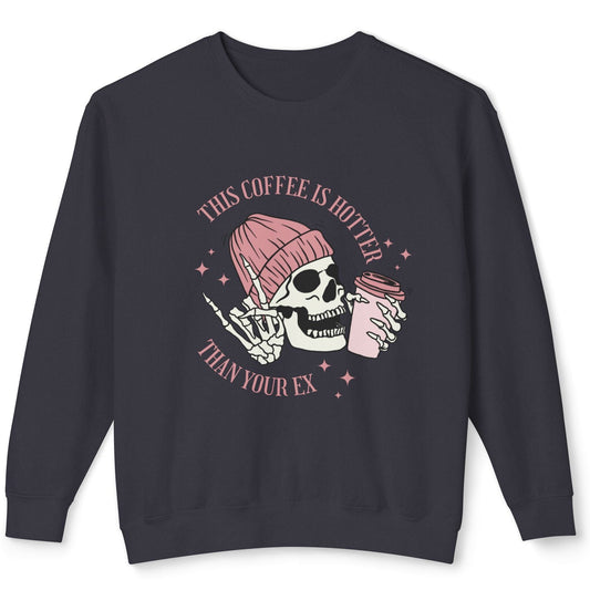 Black sweatshirt with skull and coffee cup graphic and text on a white background