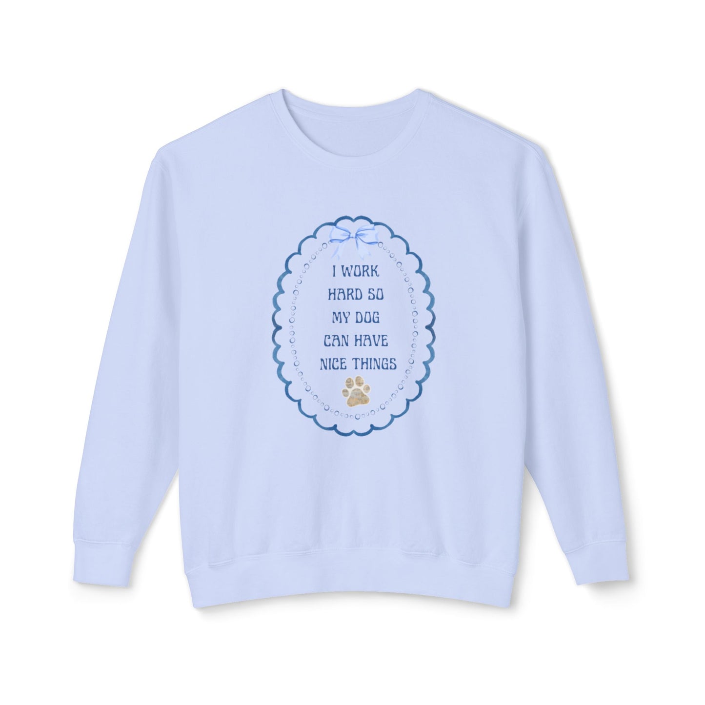 Light blue sweatshirt with text "I work hard so my dog can have nice things" and paw print design on a white background
