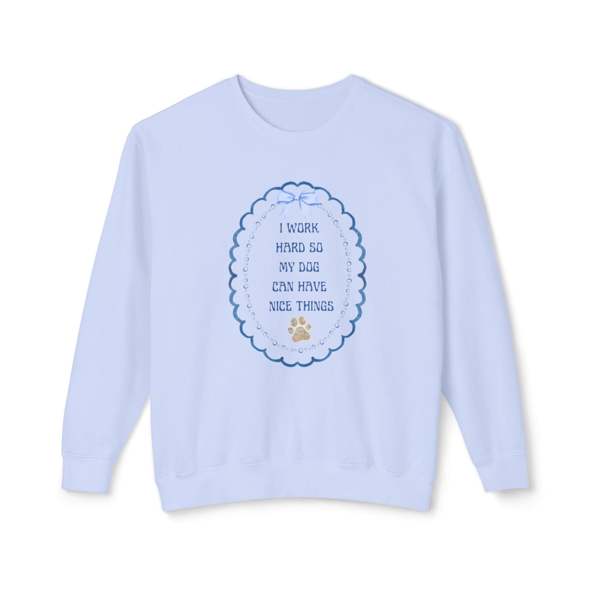 Light blue sweatshirt with text "I work hard so my dog can have nice things" and paw print design on a white background