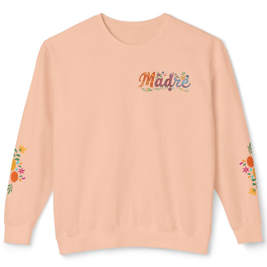 Peach sweatshirt with 'Madre' text and floral designs on sleeves against a white background