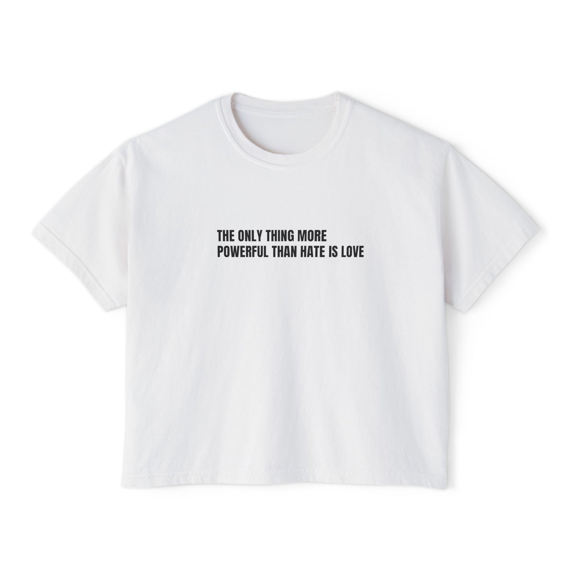 White t-shirt with black text "THE ONLY THING MORE POWERFUL THAN HATE IS LOVE" on a white background