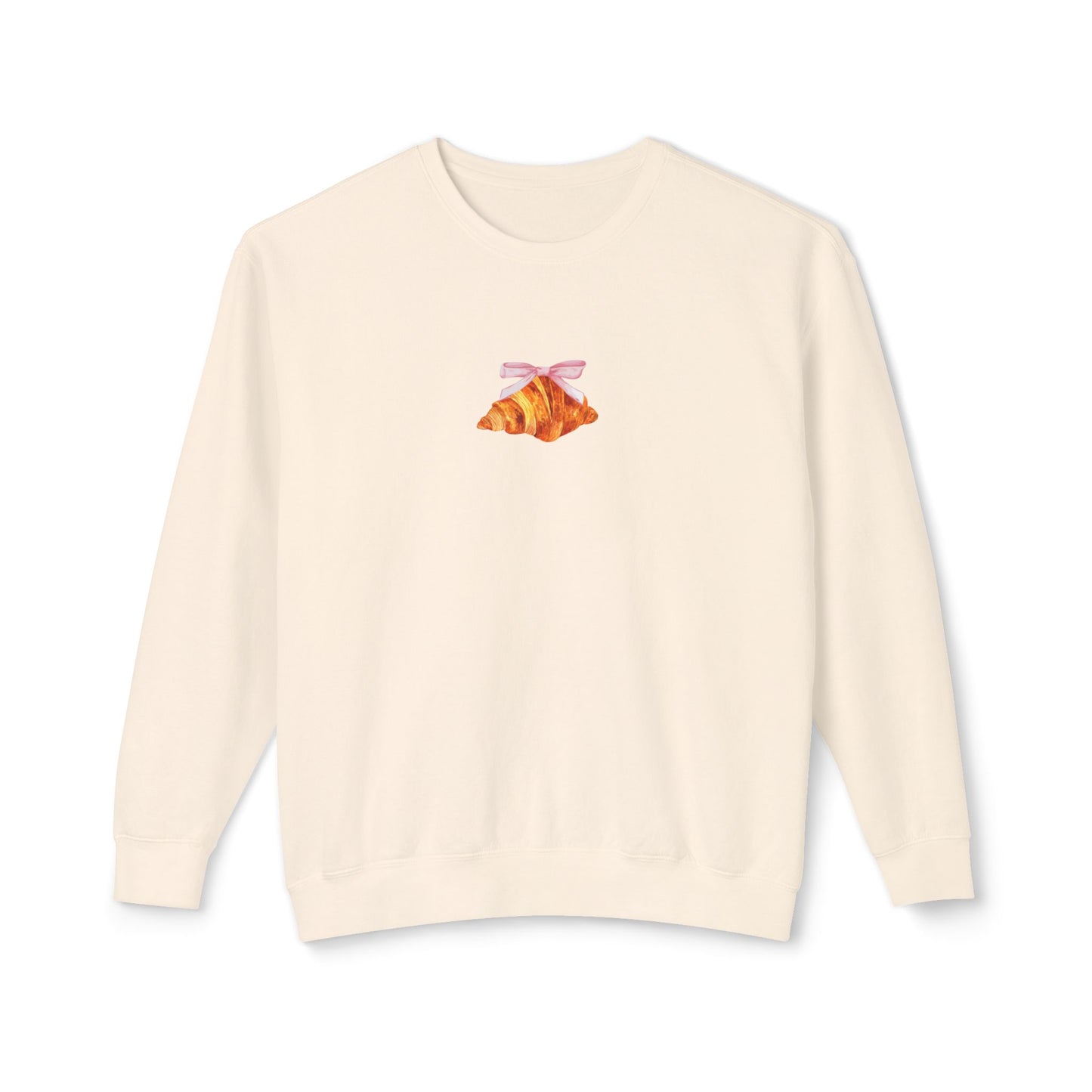ivory sweatshirt with a small croissant design on the chest against a white background