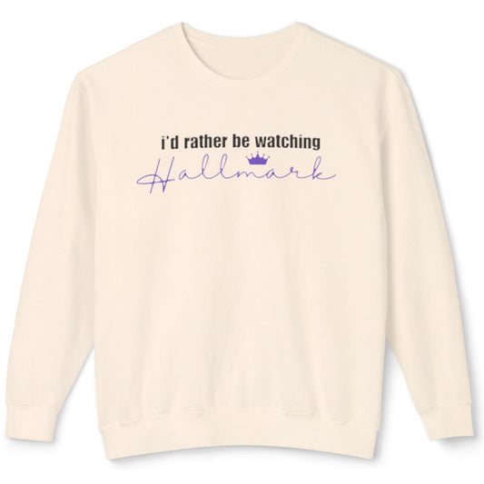 Beige sweatshirt with text 'I'd rather be watching Hallmark' on a white background