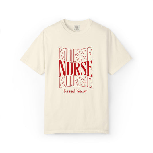 Beige t-shirt with red text 'NURSE NURSE NURSE the real lifesaver' on a white background