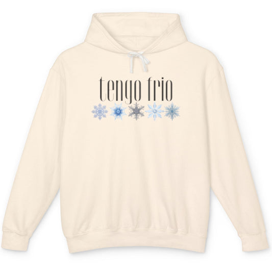 Beige hoodie with 'tengo frio' text and snowflake graphics on a white background