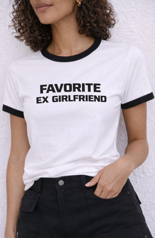 Person wearing a white t-shirt with 'FAVORITE EX GIRLFRIEND' text on a plain background